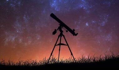 refractor telescope under a starry sky