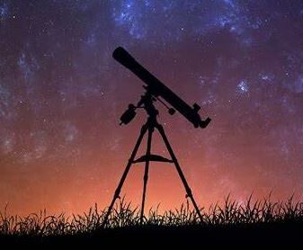 refractor telescope under a starry sky