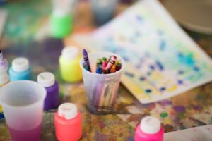close -up of plastic containers and colours