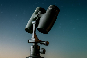 Binoculars on a tripod with an adapter